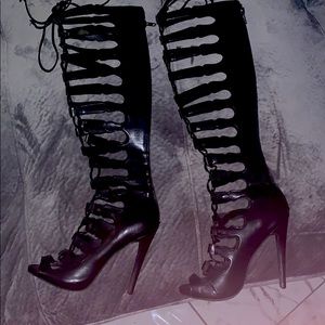 Woman’s lace up knee high boots